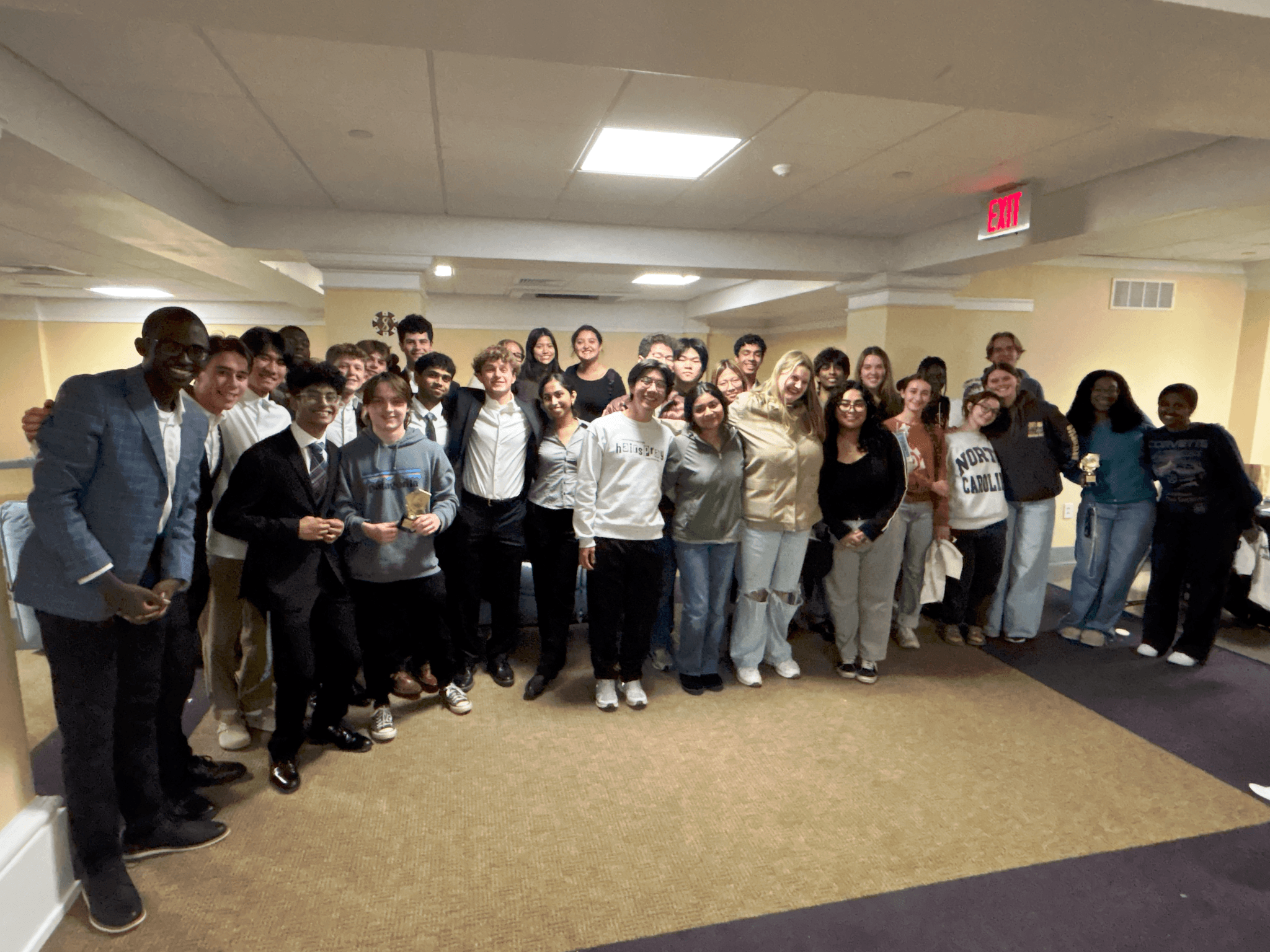 Devin smiling with the residents on his floor