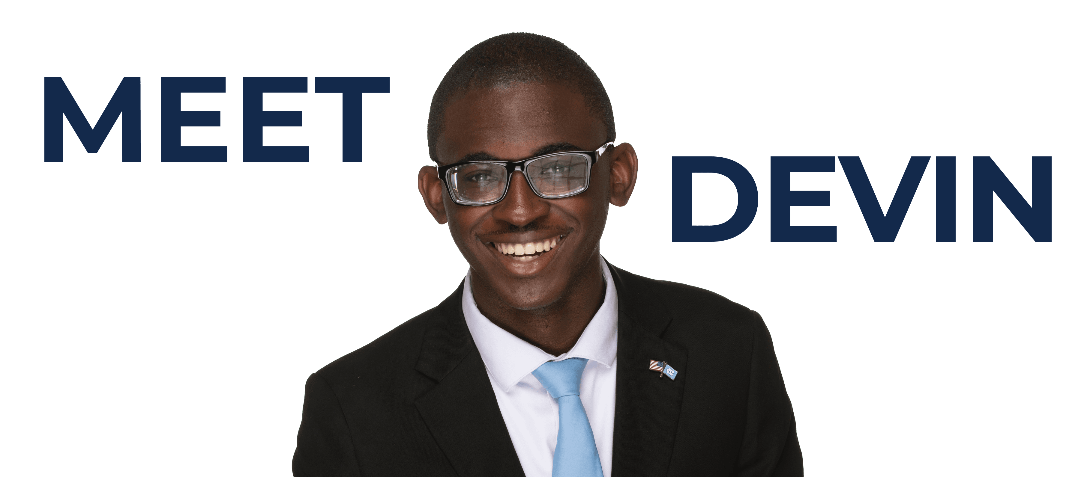 Devin wearing a suit with a Carolina Blue tie